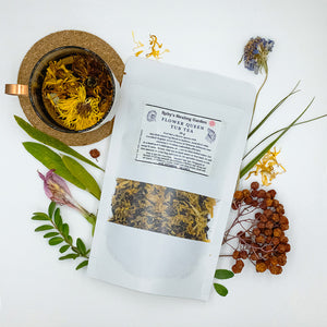 "Flower Queen" tub tea package with flowers around it.